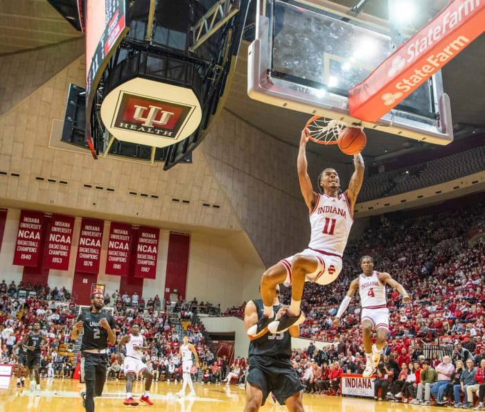 Indiana's CJ Gunn (11) dunks during the Indiana versus University of Indianapolis men's basketball game at Simon Skjodt Assembly Hall on Sunday, Oct. 29, 2023.